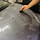 Clear bra installation on Lamborghini hood. protection from rock chips
